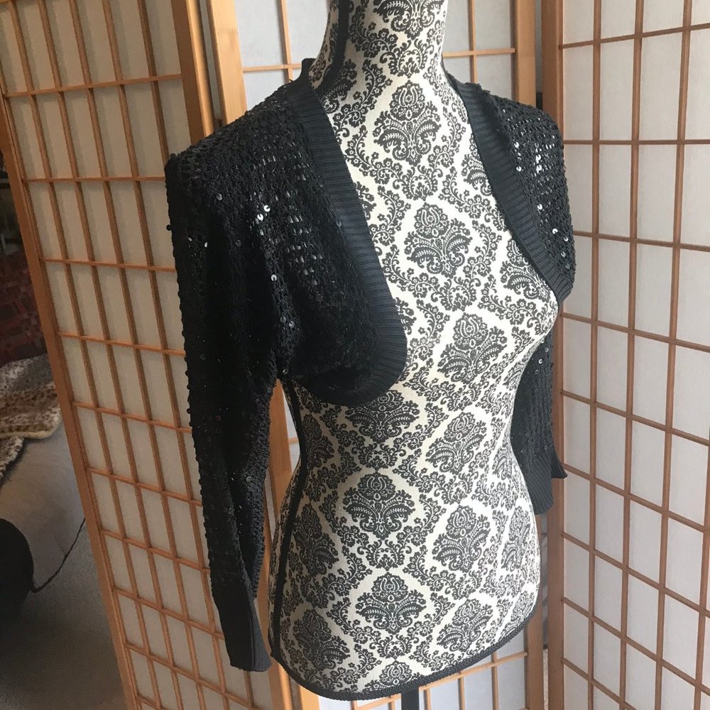 Black shrug